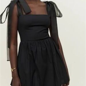 Elegant Black Dress with Bow Straps